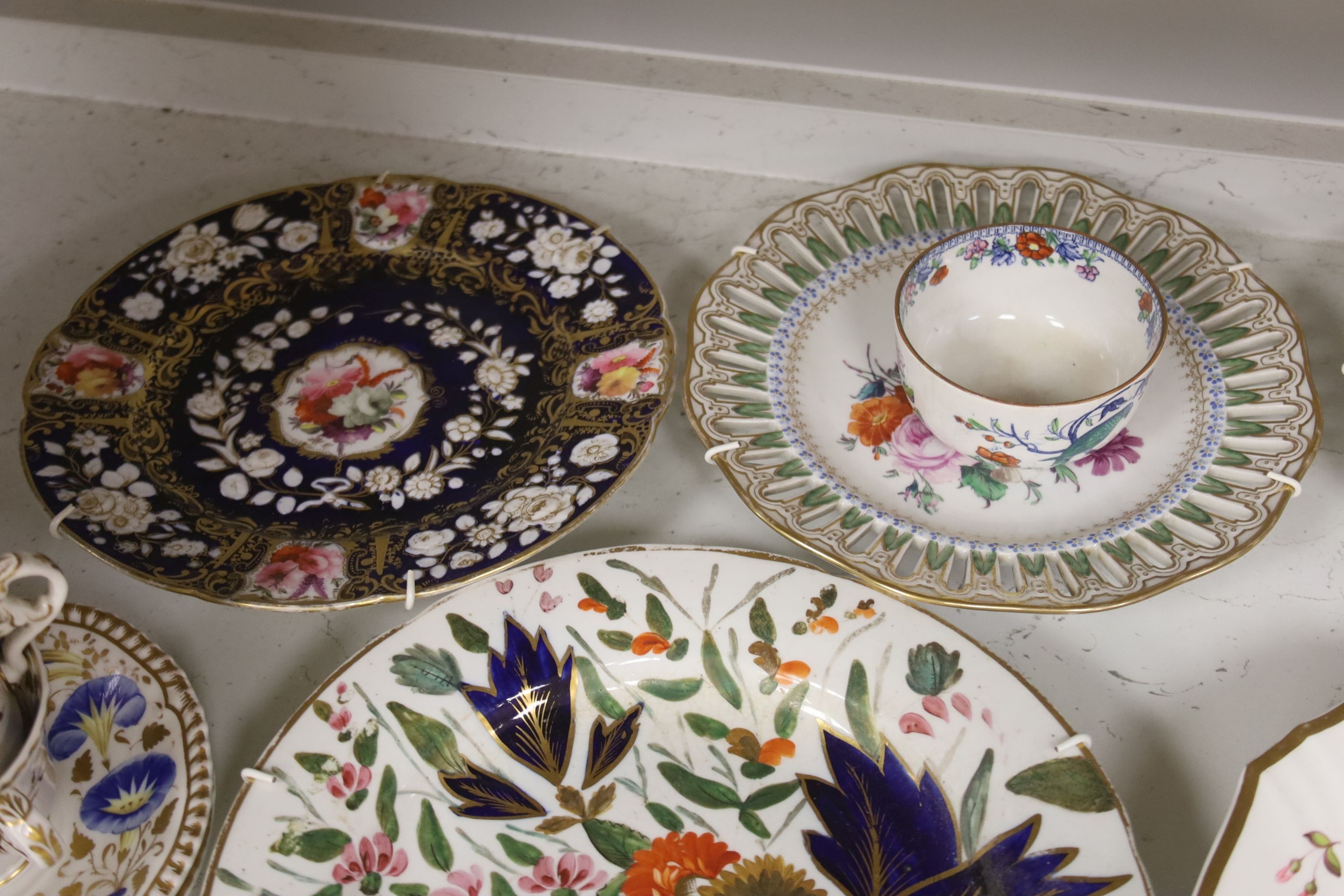 The collection of 19th century English and German porcelain plates, two coffee cups and saucers etc.